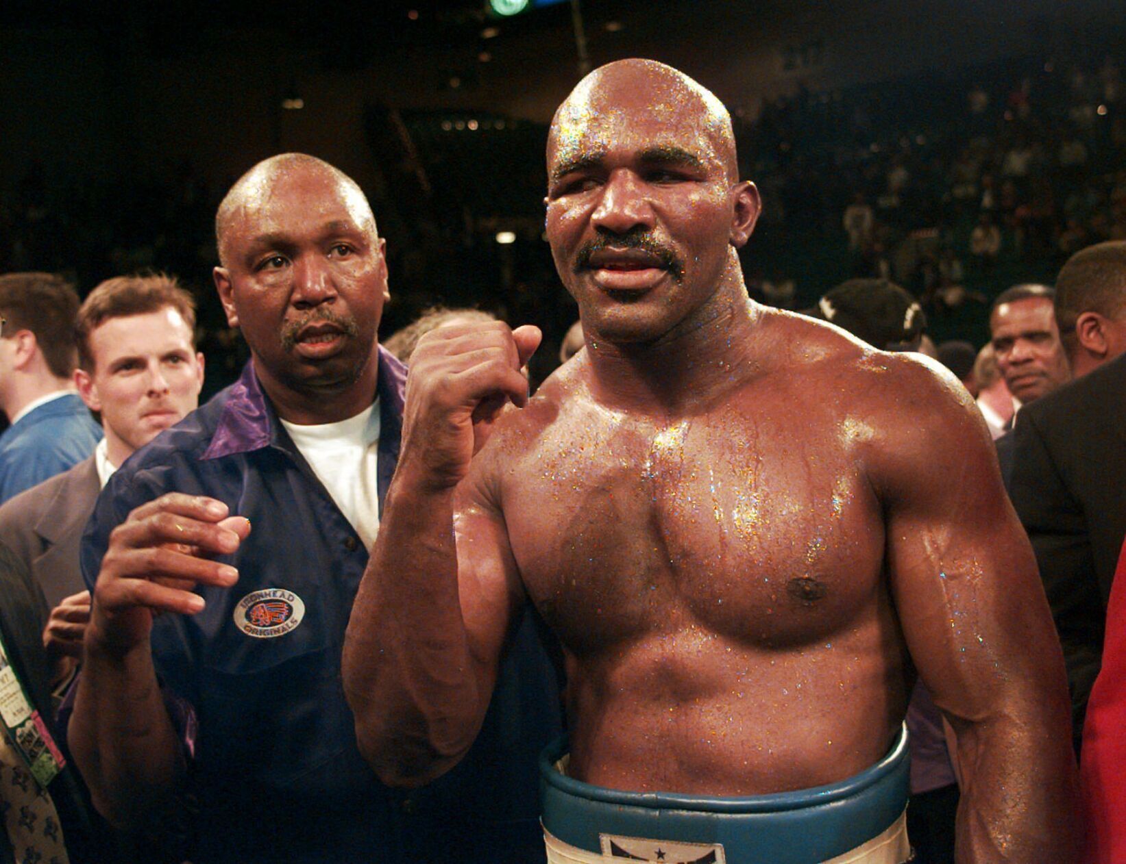 1996: Evander Holyfield pounds Mike Tyson into submission in 11th round